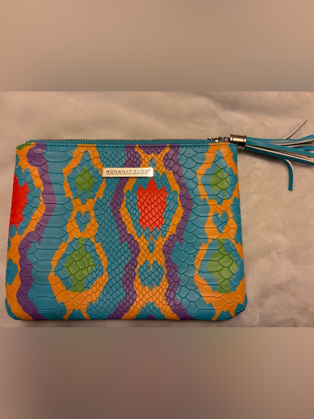 Rodan + Fields Turquoise Orange Purple Multicolor Snake-Print Wristlet